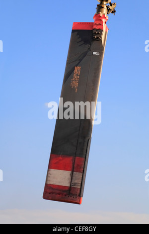 Tail rotor blade against blue sky, military helicopter Stock Photo