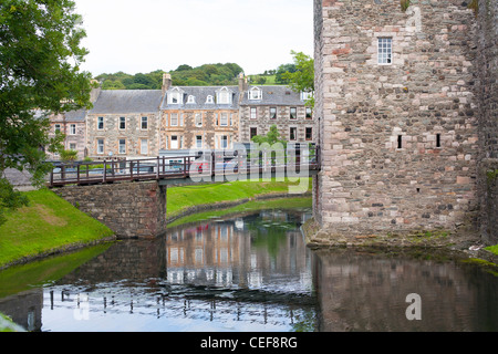 A view of Rothesay Castle across the moat in Rothesay on the Isle of Bute in Scotland Stock Photo