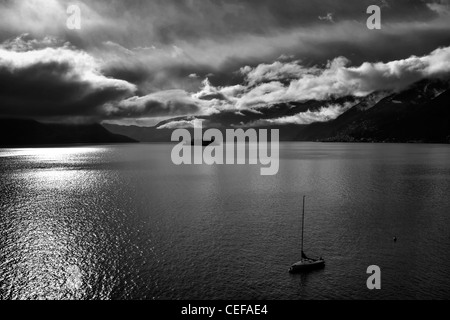 Clouds over the Lago Maggiore, which had formed after a rain in the winter. Stock Photo