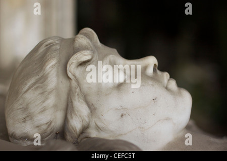 Statue of the sleeping face of a lady in the Campo Verano cemetery in Rome Italy Stock Photo