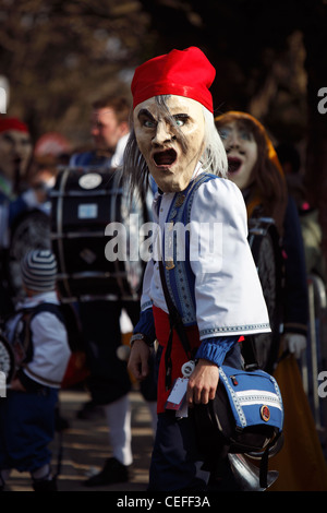 Residents gather for the annual spring festival of Fashnacht on Fat Monday in the old town of Lucerne (Luzern), Switzerland Stock Photo