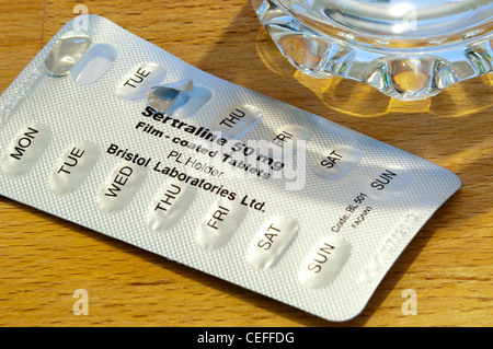 A pack of Sertraline tablets on a bedside table, used as treatment for depression. Stock Photo