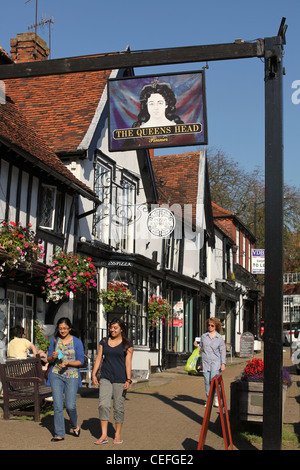 A view of The Queens Head Pub and Pinner High Street, Middlesex, London UK Stock Photo