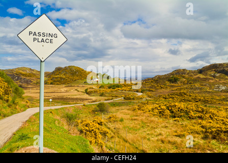 Passing place sign on narrow winding single track road in the scottish highlands near Lochinver Sutherland Scotland UK GB EU