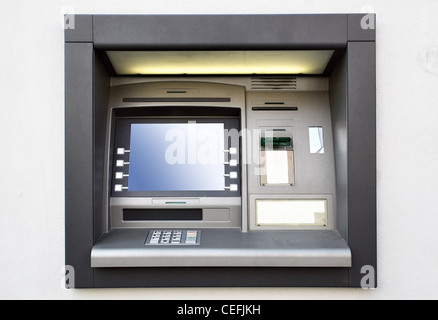 Automated teller machine close up on a wall Stock Photo
