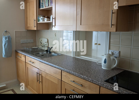 Modern Kitchen interior with Fitted storage cabinets, UK Stock Photo