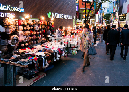 Streets stalls selling various fashion items in the evening in the popular shopping district of Myeongdong in Seoul, Korea Stock Photo