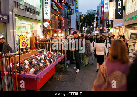 Streets stalls selling various fashion items in the evening in the popular shopping district of Myeongdong in Seoul, Korea Stock Photo