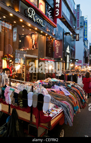 Streets stalls selling various fashion items in the evening in the popular shopping district of Myeongdong in Seoul, Korea Stock Photo