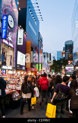 Crowded street in the evening in the popular shopping district of Myeongdong in Seoul, Korea Stock Photo