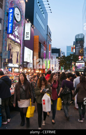 Crowded street in the evening in the popular shopping district of Myeongdong in Seoul, Korea Stock Photo