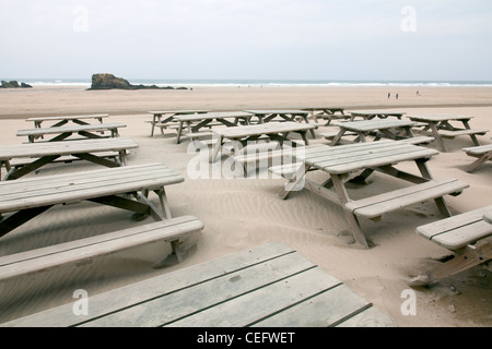 Perranporth, Cornwall, England the tables at The Watering Hole Bar, Pub on the beach looking out  to sea coast Stock Photo