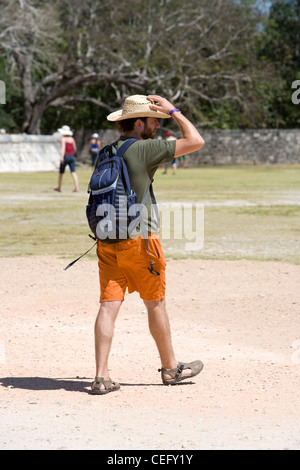 Tourist in hat and shorts, Chichen Itza, Yucatan, Mexico Stock Photo
