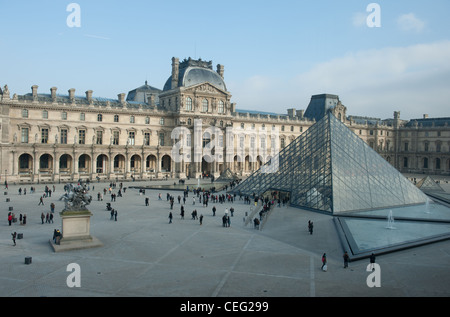 The glass pyramid of Leoh Ming Pei  is the landmark of the inner court of the Louvre, royal palace and museum in Paris,France Stock Photo