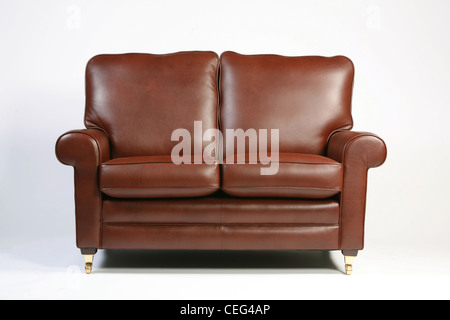 Traditional brown leather sofa on a white background Stock Photo