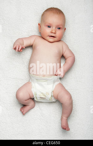 Infant wearing Huggies baby diaper with yellow line turning blue