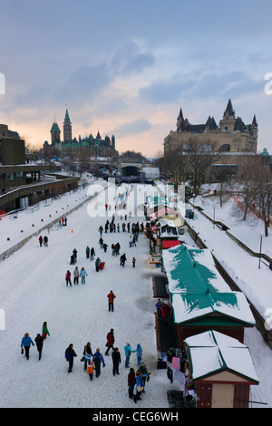 Ice skaters on Rideau Canal during Winterlude Festival, Ottawa, Canada Stock Photo