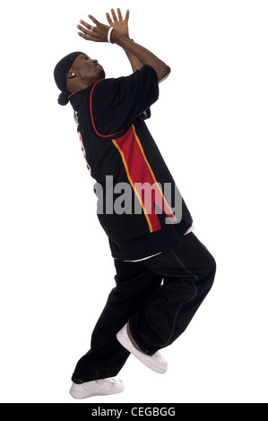 Cool young hip-hop dancer on white background Stock Photo