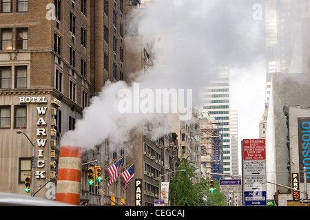 Vapor vents in the street, New York City Stock Photo - Alamy