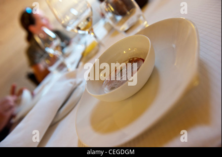 Noir de Crimee cold dish with marigold herb and anise, Flocons de Sel gourmet restaurant & Hotel. Megeve. France Stock Photo