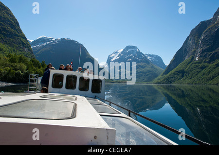 A scenic boat trip across the waters of Lovatnet lake, Jostedalsbreen national park.  Near Loen. Lodal Valley. Nordfjord. Norway Stock Photo