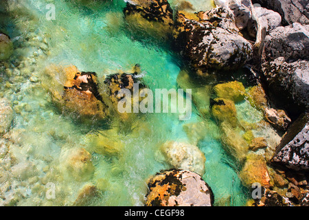 Emerald alpine river water, Soca / Isonzo, Slovenia Stock Photo