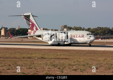 Qatar Emiri Air Force Boeing C-17 Globemaster III cargo transport aircraft taxiing for departure from Malta Stock Photo