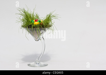 Happy Easter colorful jellybeans candies in a glass cup pictures images   large high resolution cut out cutout isolated horizontal in USA US hi-res Stock Photo