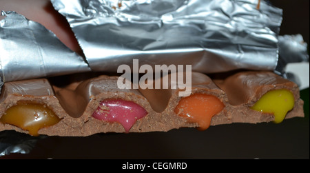 cadbury snack pack block, with fillings oozing out. Stock Photo