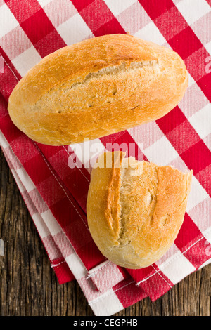 the bun on red and white checkered napkin Stock Photo
