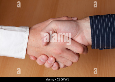 Hand in hand, young people Stock Photo