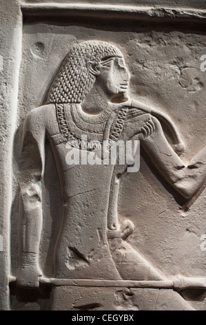 Egyptian stone carvings and painted Hieroglyphics Stock Photo