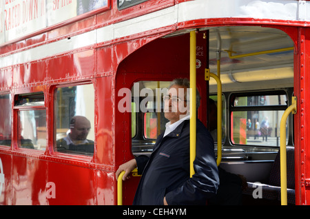 Bus Conductor on a Routemaster Stock Photo