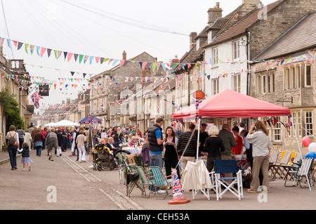 People celebrating at a traditional English Street Party Stock Photo