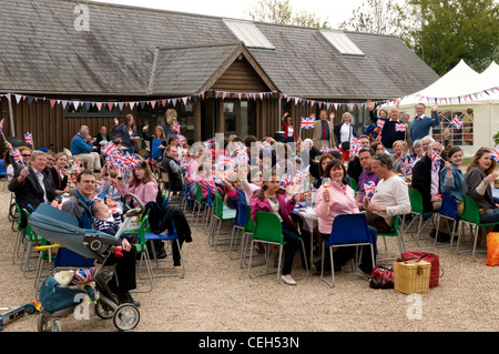 People celebrating at a traditional English Street Party Stock Photo