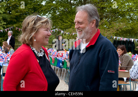 People celebrating at a traditional English Street Party Stock Photo