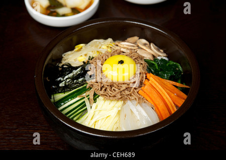 Korean noodles with egg yolk and bean sprouts. Stock Photo