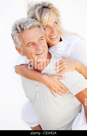 Mature couple smiling and embracing Stock Photo