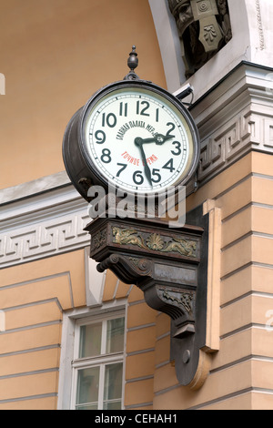 The clock on the wall at the Palace Square in St. Petersburg Stock Photo