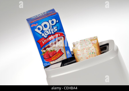 Box of Kellogg's pop-tarts with strawberry toaster pastry in toaster on white background. USA Stock Photo