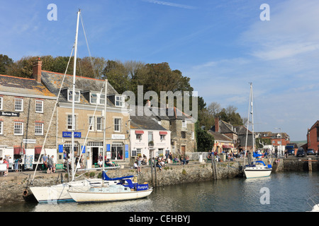Harbourfront busy with tourists on quay around village harbour in summer on Cornish coast. Padstow Cornwall England UK, Britain Stock Photo