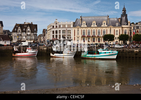 Fishing boats moored on the River Touques at Trouville sur Mer, Normandy, France Stock Photo