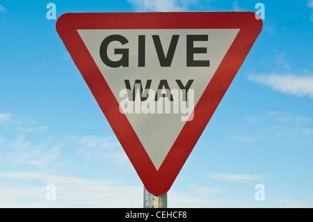 british red and white triangular road sign warning cyclists to go Stock ...