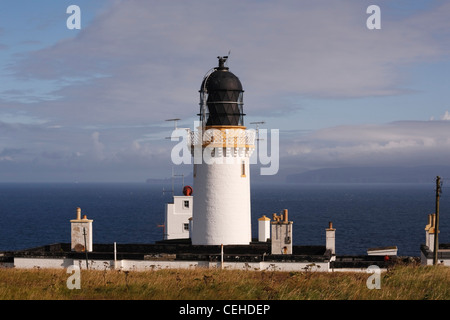 Dunnet Head Lighthouse, with the island of Hoy in the distance. Stock Photo