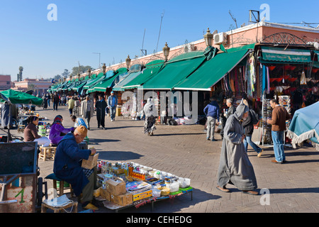 Stalls and shops along the edge of Djemaa el Fna sqare, Marrakech, Morocco, North Africa Stock Photo