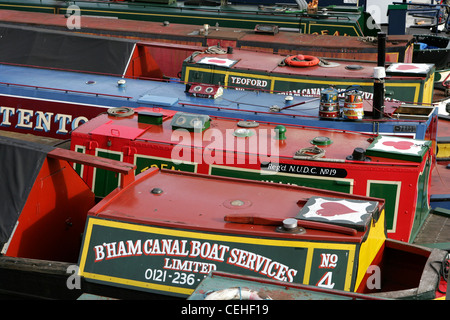 Selection of narrow boats moored up in birminham city centre on the birmingham and worcester canal, feb 2012. Stock Photo