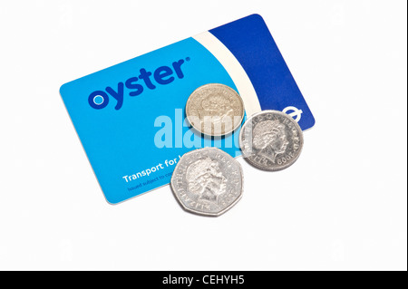 An Oyster card and British coins Stock Photo