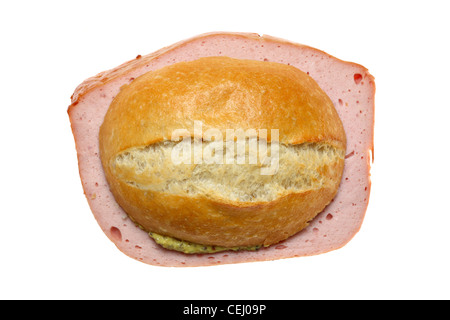 Nutrition, fast food. Typical German Leberkaes. Fleischkaese. A kind of meatloaf, sliced, with sweet mustard in a bread roll. Stock Photo