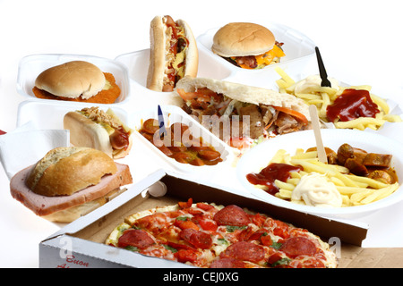 Nutrition. Compilation, composing different fast food dishes. Hot dog, Cheeseburger, Turkish kebab, pizza, sausages, sandwich. Stock Photo