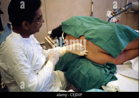 Epidural Pregnant Woman Being Given Epidural Stock Photo